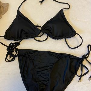Black VENUS bathing suit.